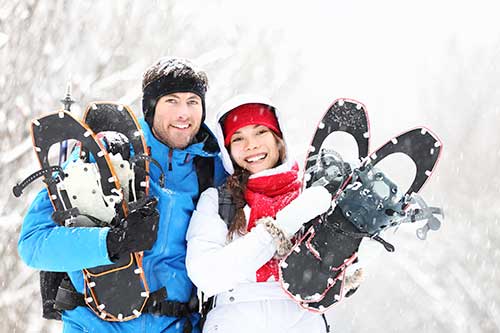 couple with snowshoes